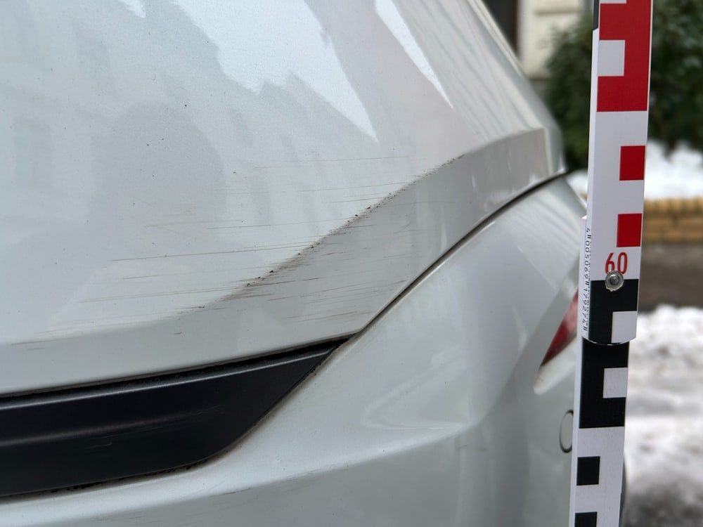 Detailaufnahme eines dokumentierten Unfallschadens