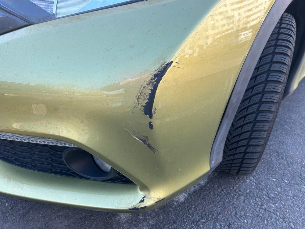 Vermessung eines Unfallschadens am Fahrzeug
